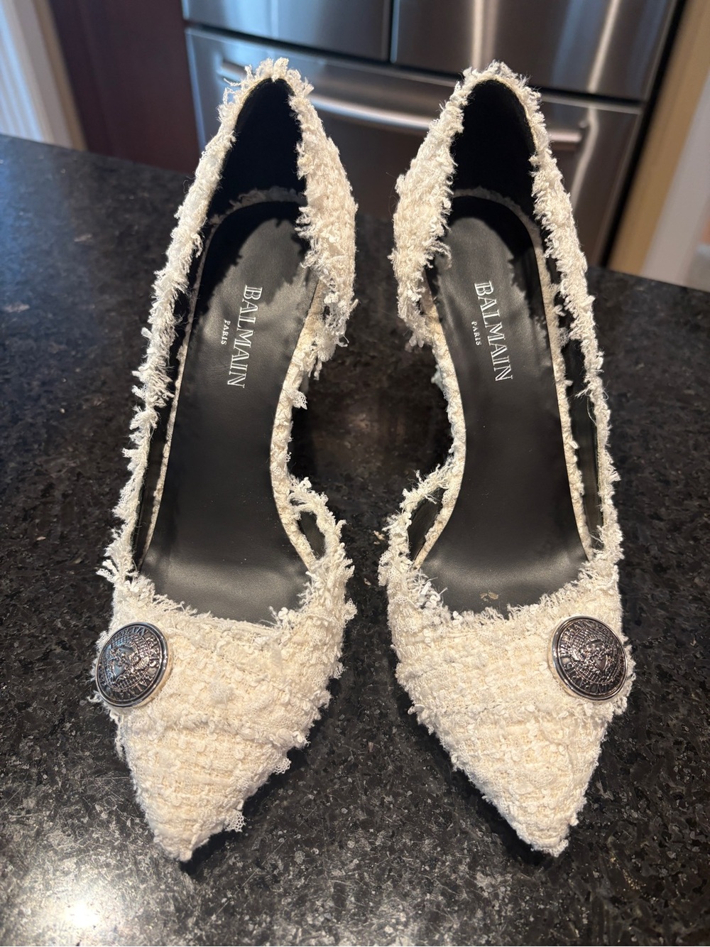 Balmain White Pointed Heels with Medallion